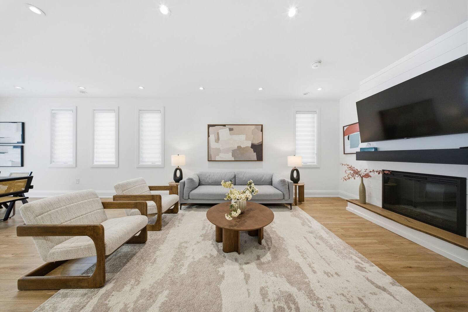 Living room with fireplace and TV